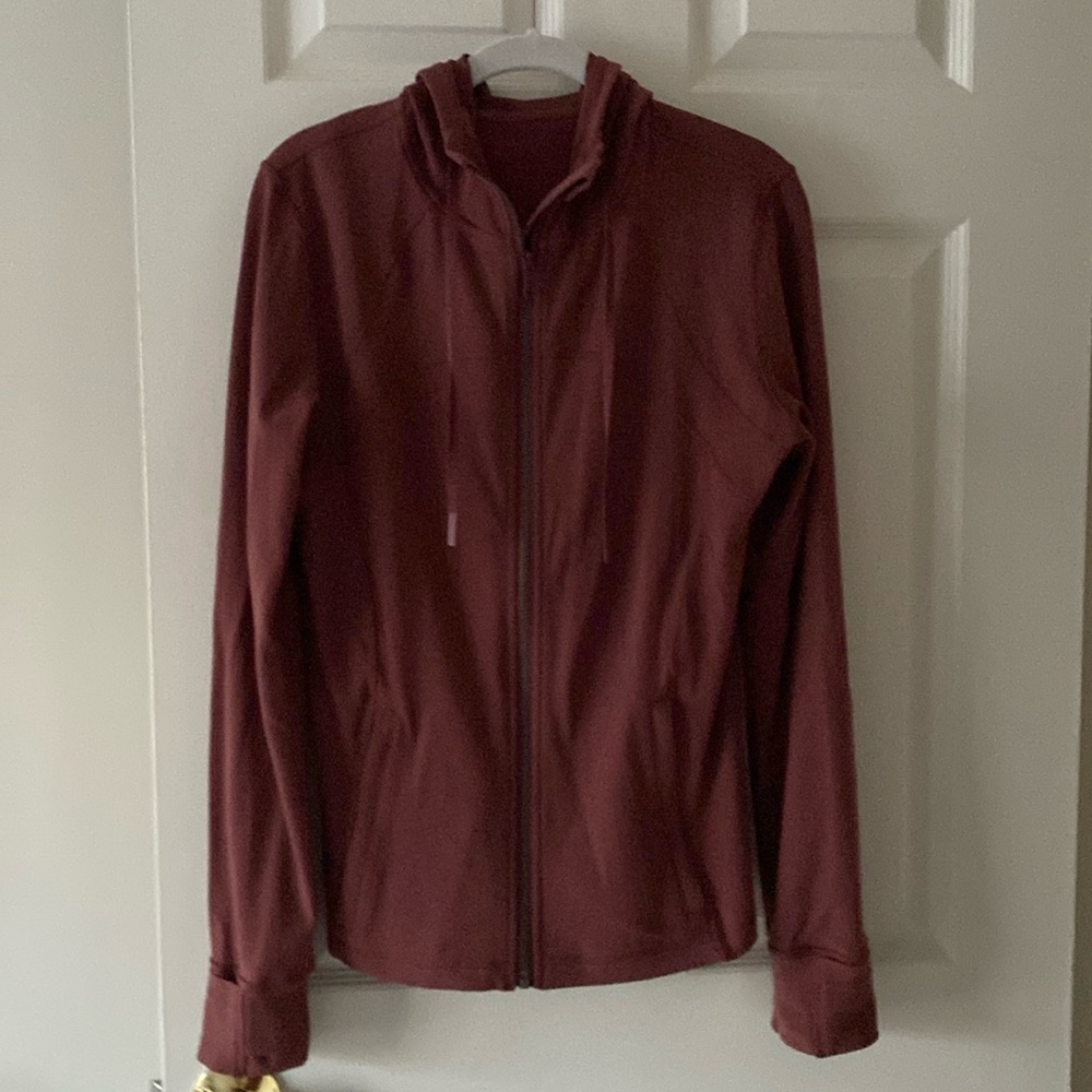 Never worn hooded Define Jacket size 12. Dusty red color.
